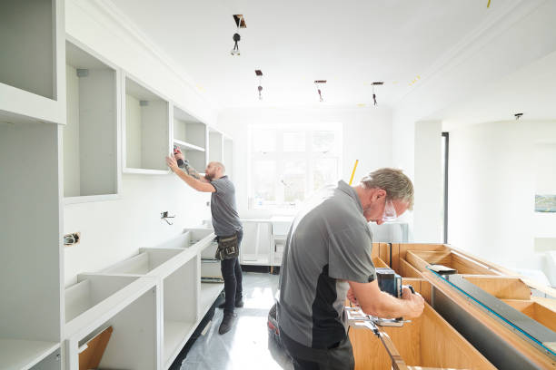 two joiners installing a kitchen two joiners installing a kitchen
